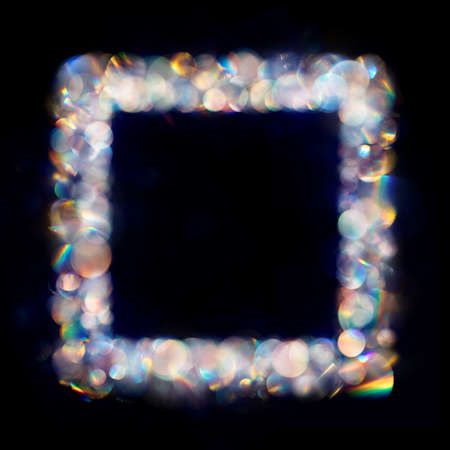 Iridescent neon colored multiple bokeh spots in square frameの写真素材