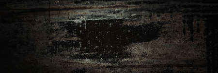 Old black rusty rough shabby metal textureの写真素材