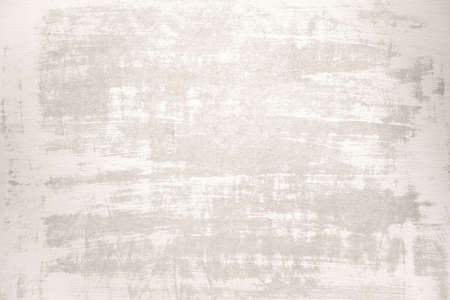 Pastel warm white texture background. Textured wall washed in sunlightの写真素材