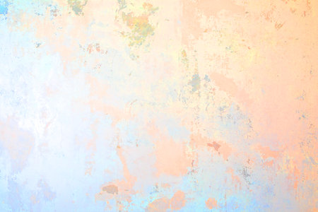 Old plastered wall painted in colorful spring colorsの写真素材