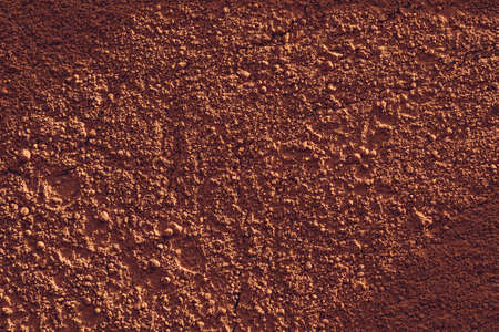 Terracotta powder soil or clay-like texture backgroundの写真素材