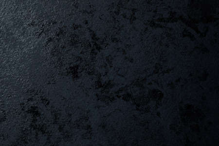 Abstract black paint on black textured paperの写真素材