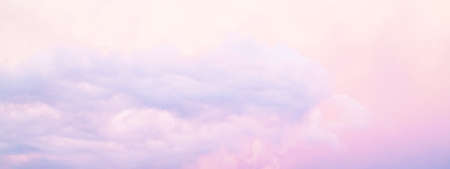Colorful bright cloudy sunset sky abstract texture backgroundの写真素材