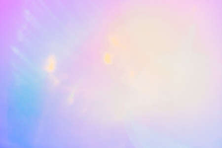 Bright colorful texture background in neon colors with lens flareの写真素材