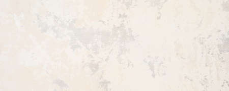 Light milky or ivory, beige and gray wall texture backgroundの写真素材