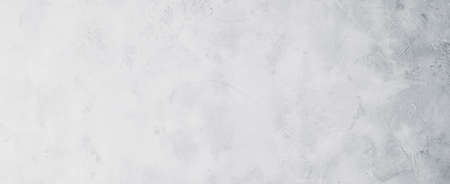 White or light gray concrete wall texture backgroundの写真素材