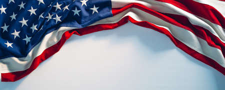 US flag on white paint texture. 4th of July USA Independence Day banner copy spaceの写真素材