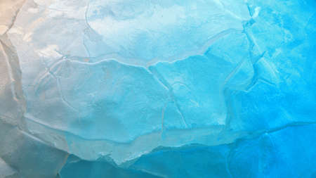 Blue cracked ice texture backgroundの写真素材