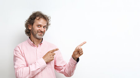 Funny smiling middle-aged man with curly hairの写真素材