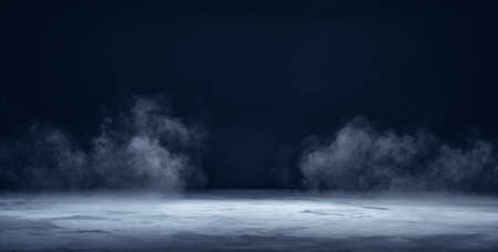 Gray textured concrete platform, podium or table with smoke in the darkの写真素材
