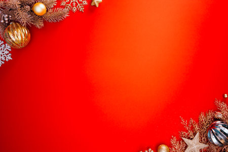 Red Christmas background with golden decorationsの写真素材