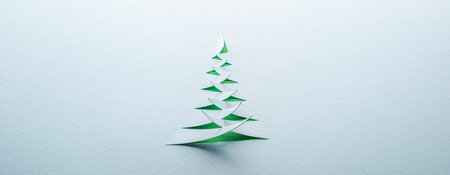 Christmas tree cut from blue and green textured paperの写真素材