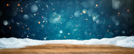 Wooden table with snow texture background for Christmas and winter holidaysの写真素材