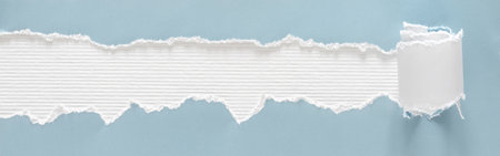 White watercolor paper texture under torn blue paper. Mockup for text.の写真素材