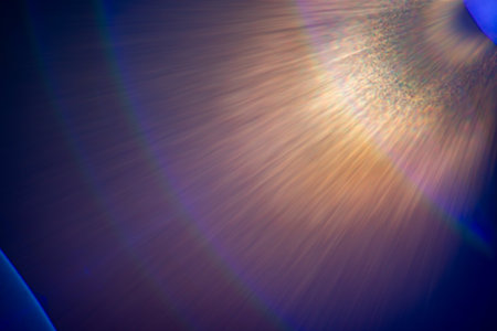 Dynamic lens flare light leak bokeh create colorful visual effect in abstract sky background.の写真素材