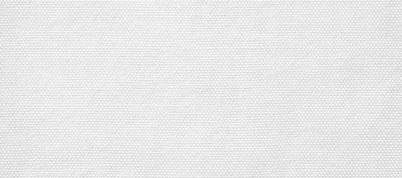 Textured white fabric background with subtle details.の写真素材