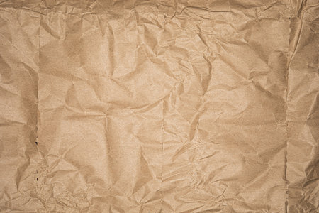 Crumpled brown kraft paper texture background.の写真素材