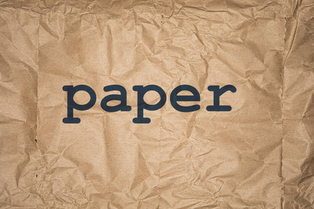 Crumpled brown kraft paper texture background.の写真素材