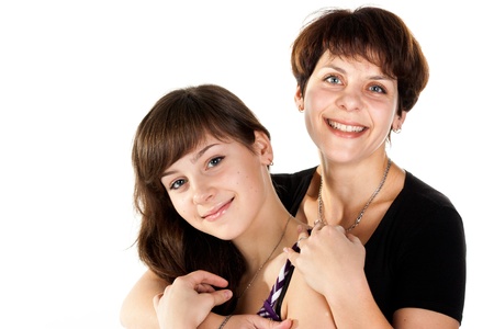 Mother and teenage daughter isolated on whiteの写真素材