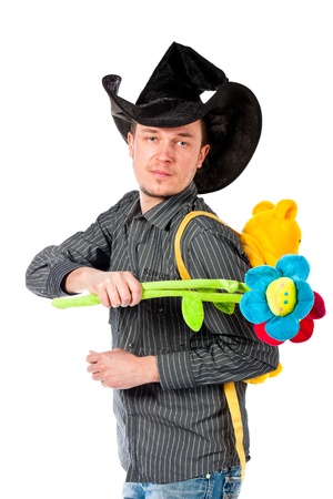 Portrait of a young man in cute hat with flowersl isolated on white の写真素材