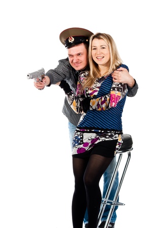A man protecting a woman with the gun isolated on white の写真素材