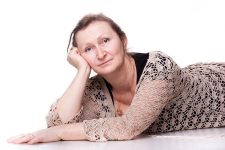 Portrait of an elderly woman isolated on whiteの写真素材