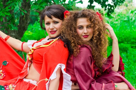 Two beautiful gypsy girls outdoorの写真素材