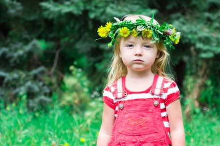 Beautiful girl in the meadow outdoorの写真素材