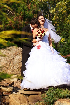 Happy bride and groom outdoorの写真素材
