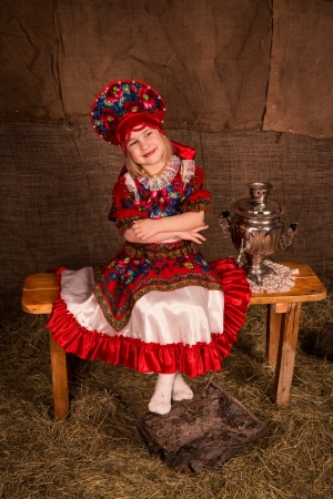 Beautiful russian girl ready to eat pancakesの写真素材