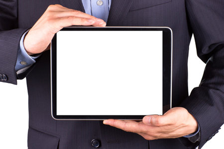 Young businessman's hands working on tablet pc isolated on white