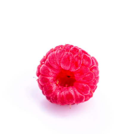 Ripe raspberry isolated on a white background
