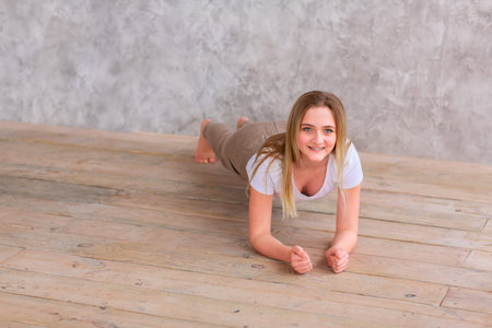 Tennage girl doing fitness gymnastics at home. Gymnastics video tutorial. Gymnastic exercises....