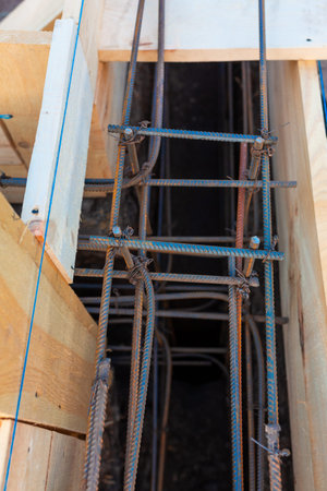 Reinforcement of corners for creating strip foundation for new house basis.