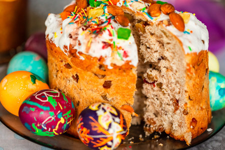 Traditional Easter holiday table served with homemade Easter cake and painted eggs