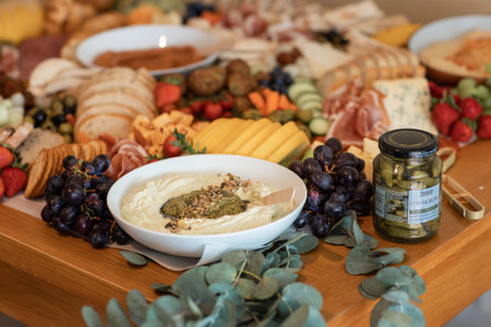 Delicious gourmet food setup of snacks for party. Creative food setup, catering service. Party food and sncacks.の写真素材