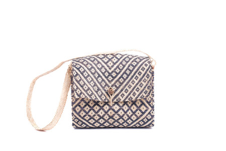 wicker woman's tote bag, isolated on white backgroundの写真素材