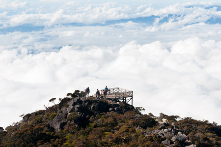KOTA KINABALU,MALAYSIA -MAY 05,2017:Unidentified climbers on Jalan Ranau of Mount Kota Kinabalu on viewpoint on May 05.2017.のeditorial素材
