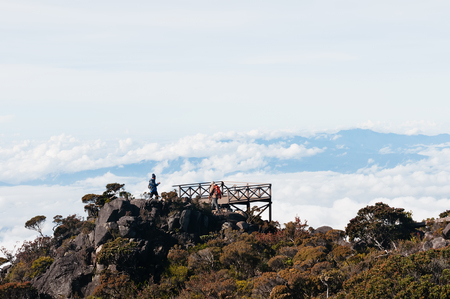 KOTA KINABALU,MALAYSIA -MAY 05,2017:Unidentified climbers on Jalan Ranau of Mount Kota Kinabalu on viewpoint on May 05.2017.のeditorial素材