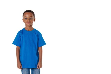 childhood and people concept- little african american boy wearing blue t-shirt and denim clothers , isolated with copyspaceの写真素材