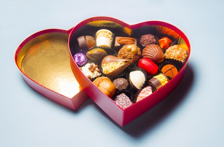 Valentines day. Chocolates in the shape of a heartの写真素材