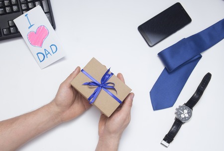 Son gives a gift to dad. Fathers Day.の写真素材