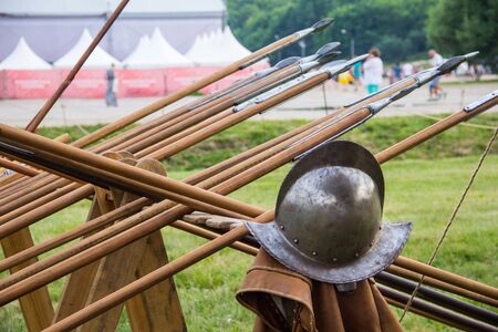 Medieval knights helmet Morion. Old spears. Historical reconstruction. Knights tournamentの写真素材