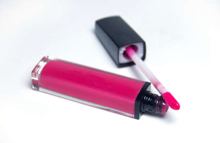 Pretty pink lip gloss isolated on whiteの写真素材