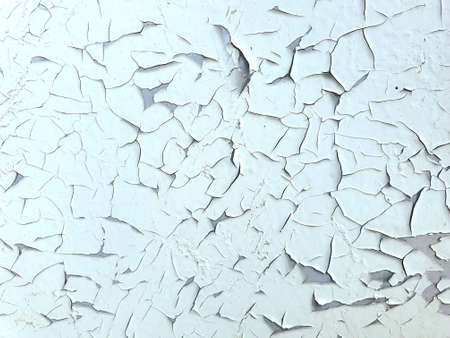 Old cracked paint, old white walls. Craquelure white backgroundの写真素材