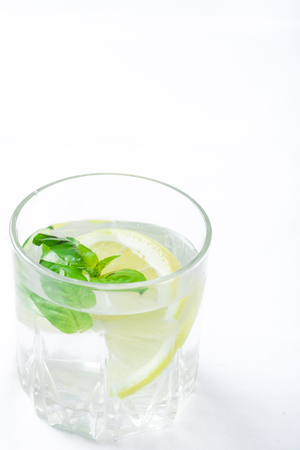 Basil lemon water. Drink infused water cocktail. Healthy lifestyle concept. Copy spaceの写真素材
