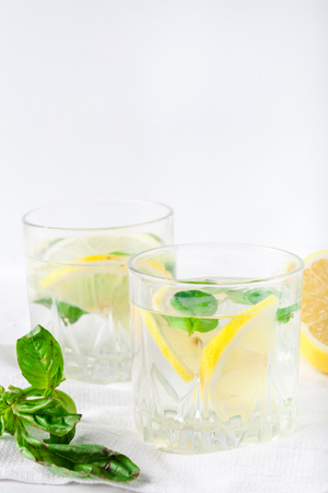 Basil lemon water. Drink infused water cocktail. Healthy lifestyle concept. Copy spaceの写真素材