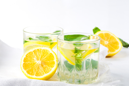 Basil lemon water. Drink infused water cocktail. Healthy lifestyle concept. Copy spaceの写真素材