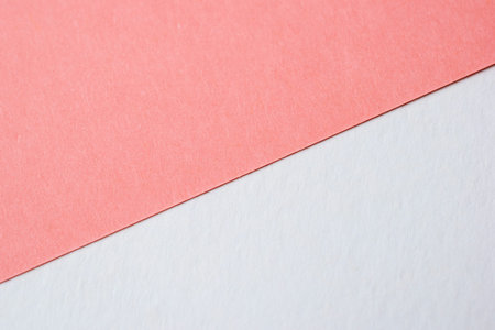 Red and white paper background. Copy space for text or design.