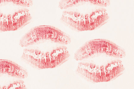Lipstick kiss imprints on white paper. Close up.の写真素材